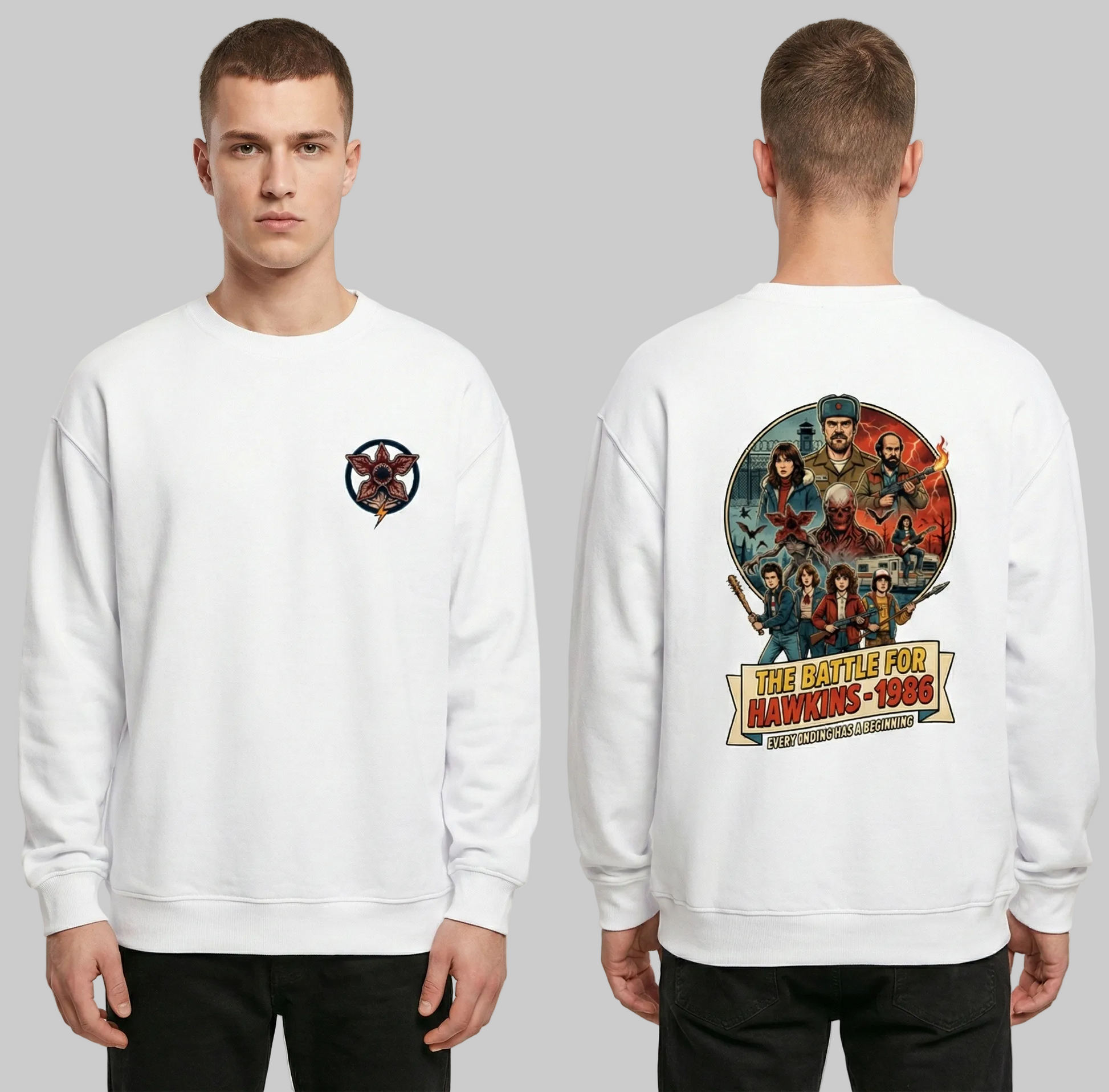 White sweatshirt with front and back graphics worn by a person on a light gray background