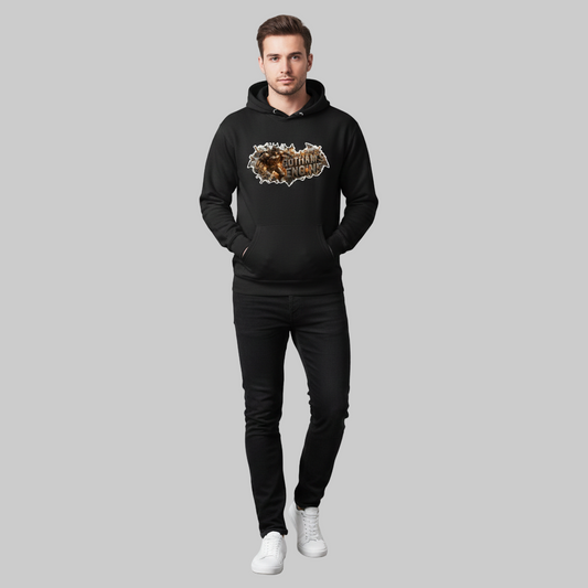 Man wearing a black hoodie with a graphic design on a plain background